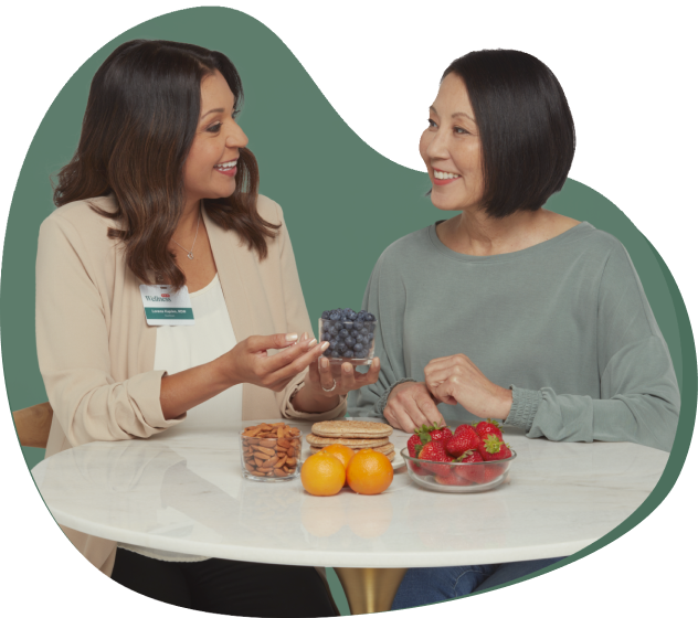 A registered dietitian talking to a person about healthy eating