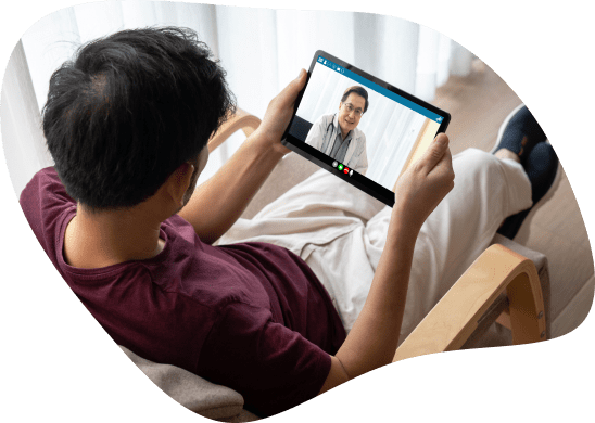 A patient speaks with a provider through a tablet